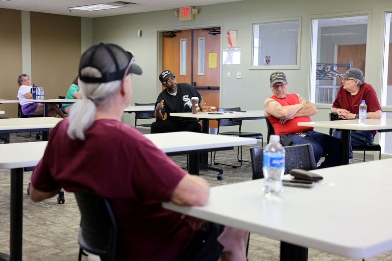Marc Campbell, of Cedar Rapids, Iowa, talks about a change he would like in a new contract during a union meeting for Amana Whirlpool workers in the International Association of Machinists (IAM) Local 1526 at the Fairfax City Hall in Fairfax, Iowa, U.S., June 13, 2026. REUTERS/Scott Morgan