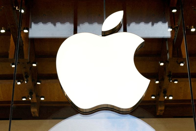 FILE PHOTO: View of an Apple logo at an Apple store in Paris, France, April 23, 2025. REUTERS/Abdul Saboor/File Photo