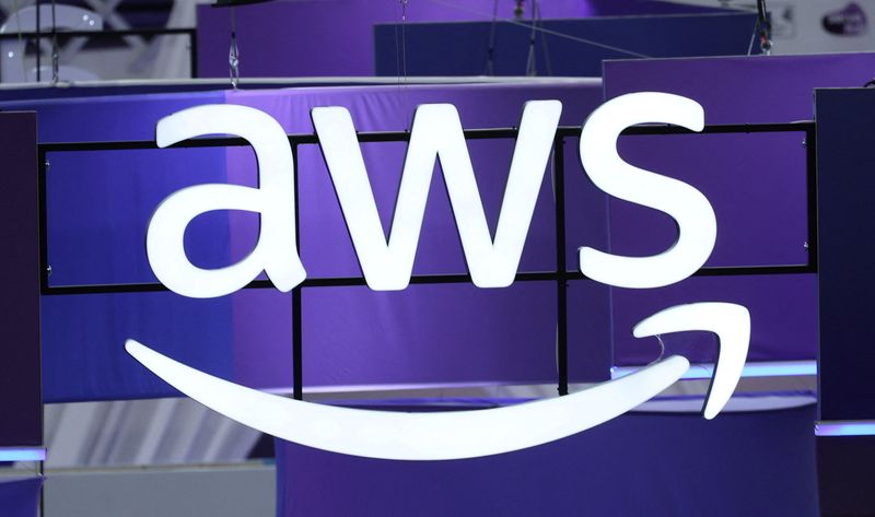 Signage for Amazon Web Services (AWS) during the London Tech Week at Olympia, in London, Britain, June 8, 2026. REUTERS/Isabel Infantes