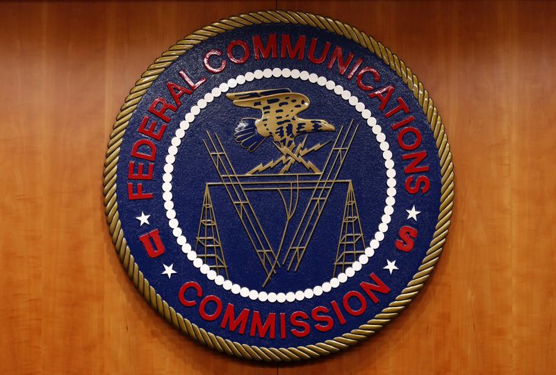The Federal Communications Commission (FCC) logo is seen before the FCC Net Neutrality hearing in Washington February 26, 2015. The FCC is expected Thursday to approve Chairman Tom Wheeler's proposed "net neutrality" rules, regulating broadband providers more heavily than in the past and restricting their power to control download speeds on the web. REUTERS/Yuri Gripas (UNITED STATES - Tags: POLITICS SCIENCE TECHNOLOGY BUSINESS TELECOMS LOGO)