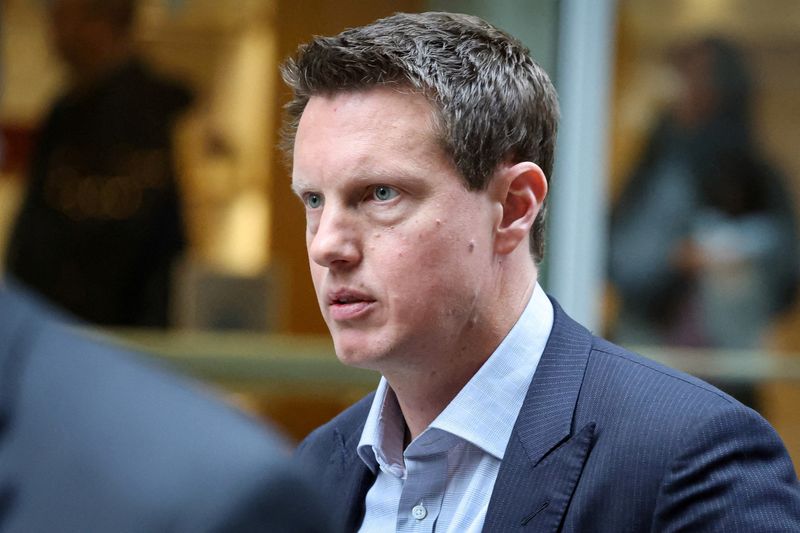 FILE PHOTO: David Ellison, CEO of Paramount Skydance, exits following an interview at the New York Stock Exchange (NYSE) in New York City, U.S., December 8, 2025.  REUTERS/Brendan McDermid/File Photo
