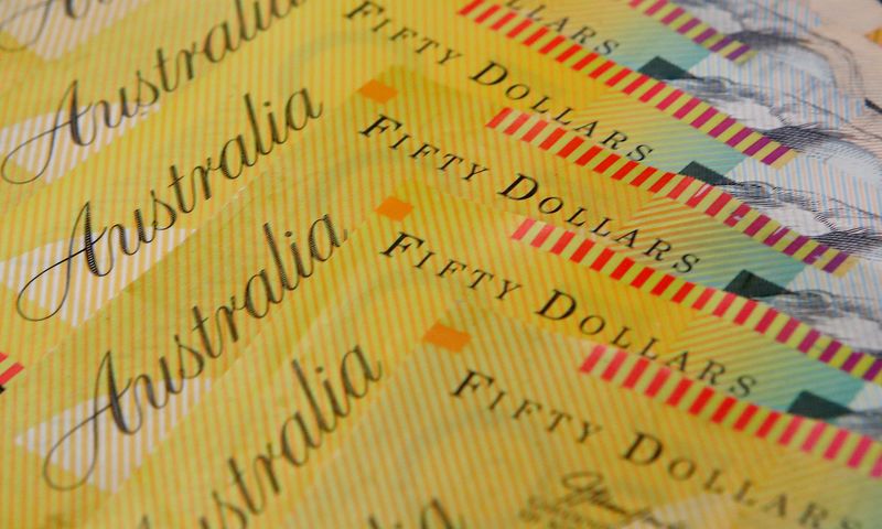 Australian dollars are seen in an illustration photo February 8, 2018. REUTERS/Daniel Munoz