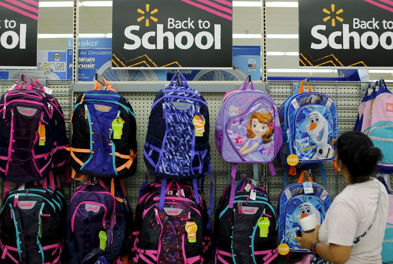 A woman shops for back to school supplies at a Walmart store in San Diego, California August 6, 2015.      REUTERS/Mike Blake