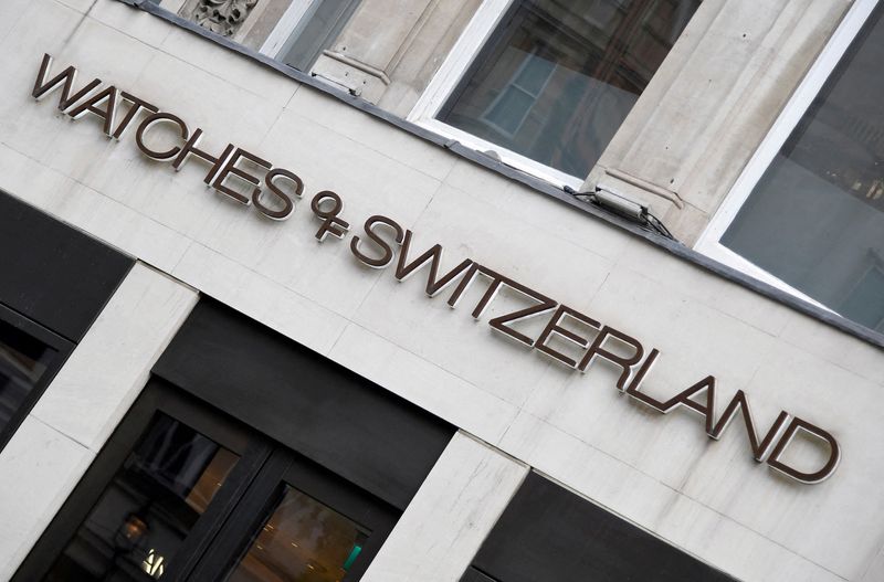 FILE PHOTO: The logo of of Watches of Switzerland is seen at a branch in London, Britain, May 30, 2019. REUTERS/Toby Melville/File Photo