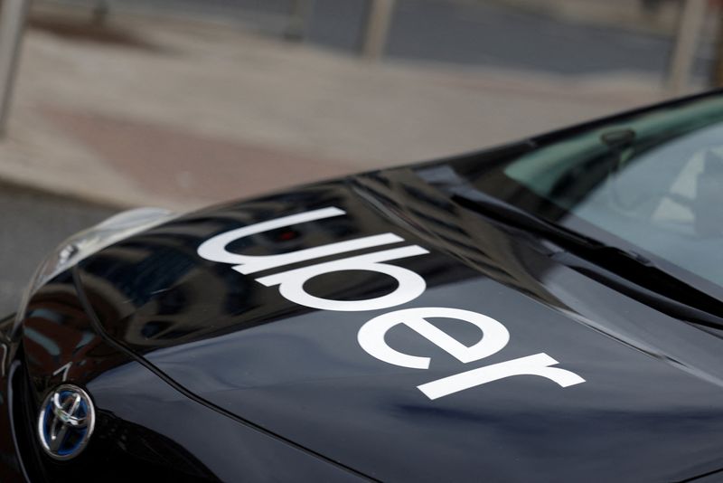 The Uber logo is seen on the bonnet of a taxi, in Dublin, Ireland, June 29, 2025. REUTERS/Clodagh Kilcoyne