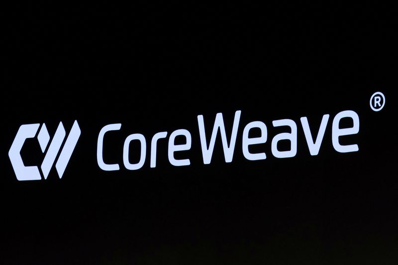 A screen displays the company logo for CoreWeave, Inc., Nvidia-backed cloud services provider, during the company's IPO at the Nasdaq Market, in New York City, U.S., March 28, 2025. REUTERS/Brendan McDermid