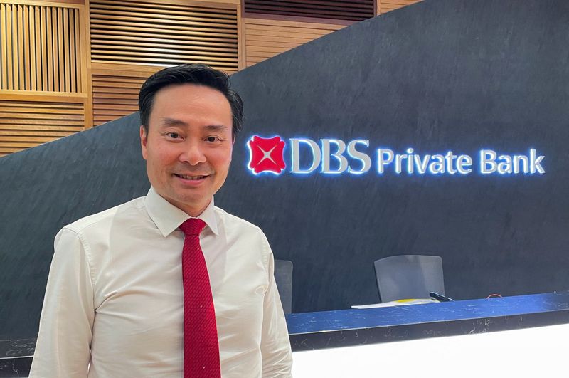 Shee Tse Koon, DBS Group Executive and Group Head of Consumer Banking and Wealth Management, poses at the bank's office in Singapore, July 14, 2026. REUTERS/Yantoultra Ngui