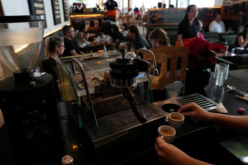 A barista prepares an espresso with robusta coffee at a coffee shop in Sao Paulo, Brazil December 3, 2025. REUTERS/Alexandre Meneghini