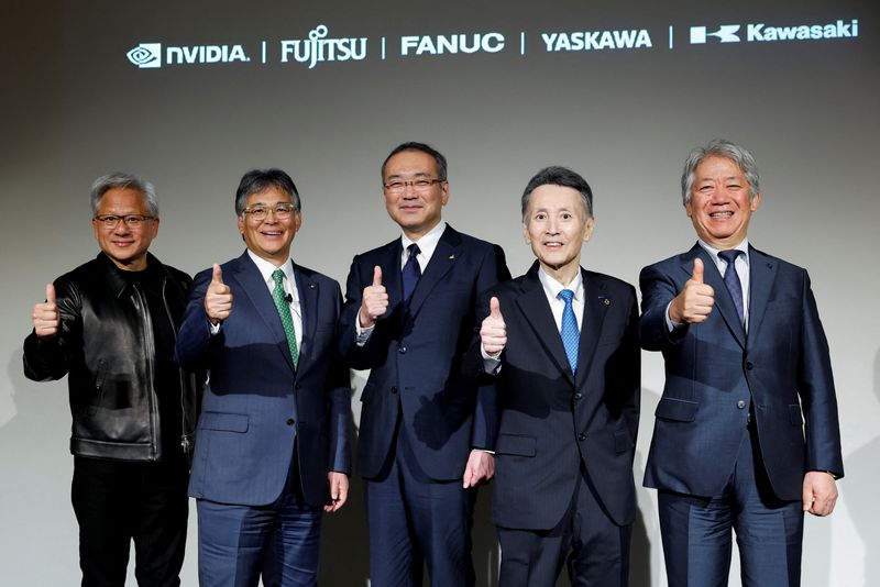 Nvidia CEO Jensen Huang, Fujitsu CEO Takahito Tokita, FANUC President and CEO Kenji Yamaguchi, Yaskawa Electric Vice Chairman and Executive Officer Masahiro Ogawa, and Kawasaki Heavy Industries President and CEO Yasuhiko Hashimoto attend a media briefing on the announcement regarding exploring physical AI development and implementation across industries, in Tokyo, Japan, July 16, 2026. REUTERS/Kim Kyung-Hoon