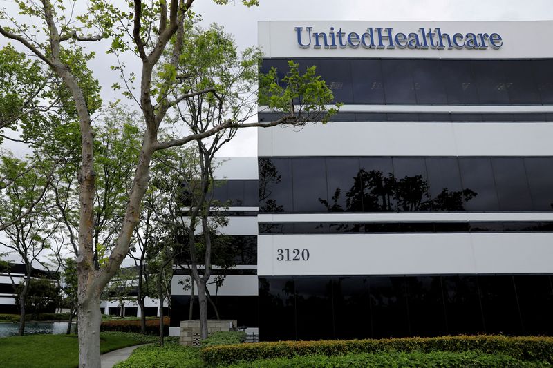 FILE PHOTO: The corporate logo of UnitedHealthcare, the insurance unit of UnitedHealth Group, appears on the side of one of their office buildings in Santa Ana, California, U.S., April 13, 2020. REUTERS/Mike Blake/File Photo