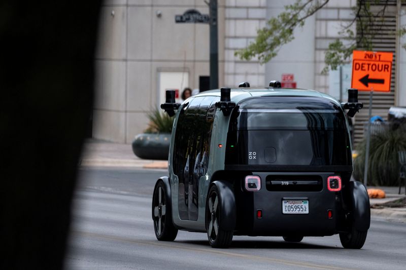 A Zoox robotaxi operates on the streets of downtown Austin, Texas, U.S., March 31, 2026.  REUTERS/Joel Angel Juarez