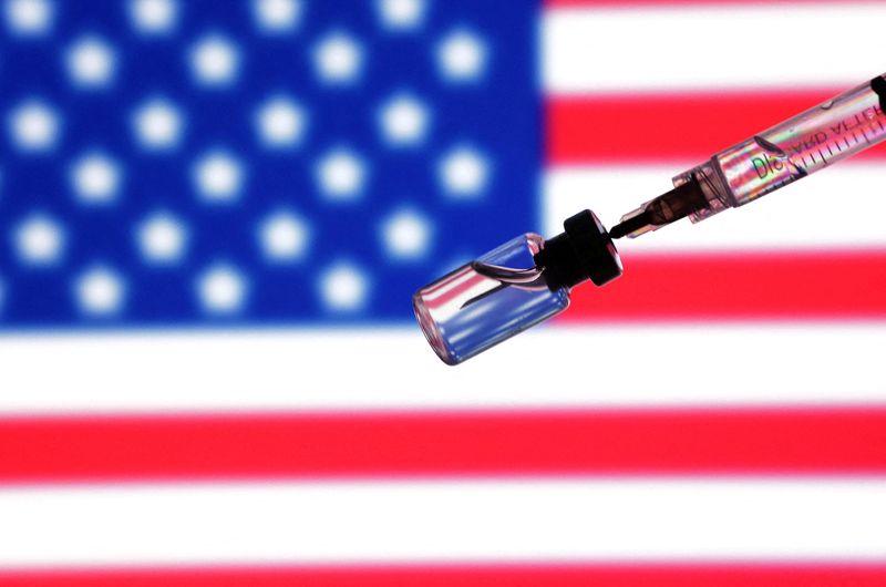 FILE PHOTO: A U.S. flag, a syringe and a vial are seen in this illustration taken May 13, 2025. REUTERS/Dado Ruvic/Illustration/File Photo