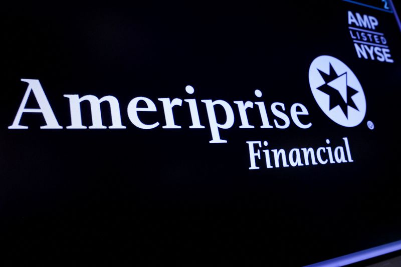 A screen displays the logo and trading information for Ameriprise Financial, Inc. on the floor of the New York Stock Exchange (NYSE) in New York City, U.S., March 29, 2023.  REUTERS/Brendan McDermid