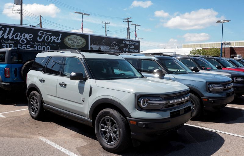 FILE PHOTO: 2025 Ford Bronco Sport vehicles sit on a dealership lot for sale in Dearborn, Michigan, U.S., May 7, 2025.  REUTERS/Rebecca Cook/File Photo