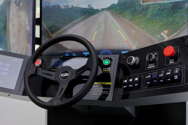 CiDi's remote-control cockpit, used when the company's electric autonomous mining trucks need to be operated manually, is seen in the dispatch center at the TCC Cement limestone quarry in Jurong, Jiangsu province, China, July 24, 2026. REUTERS/Go Nakamura