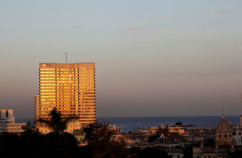 FILE PHOTO: The sun at dawn shines on Havana's five-star Hotel Melia Cohiba October 8, 2009. REUTERS/Desmond Boylan/File Photo