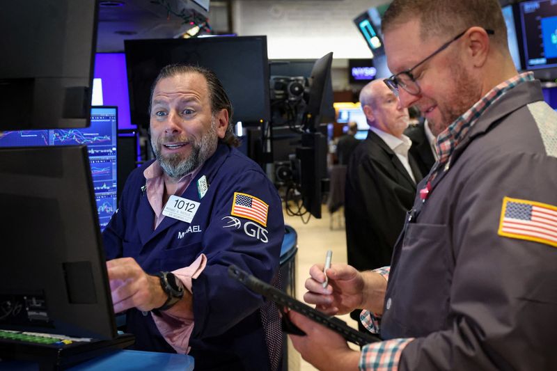 Traders work on the floor at the New York Stock Exchange (NYSE) in New York City, U.S., July 23, 2026.  REUTERS/Brendan McDermid