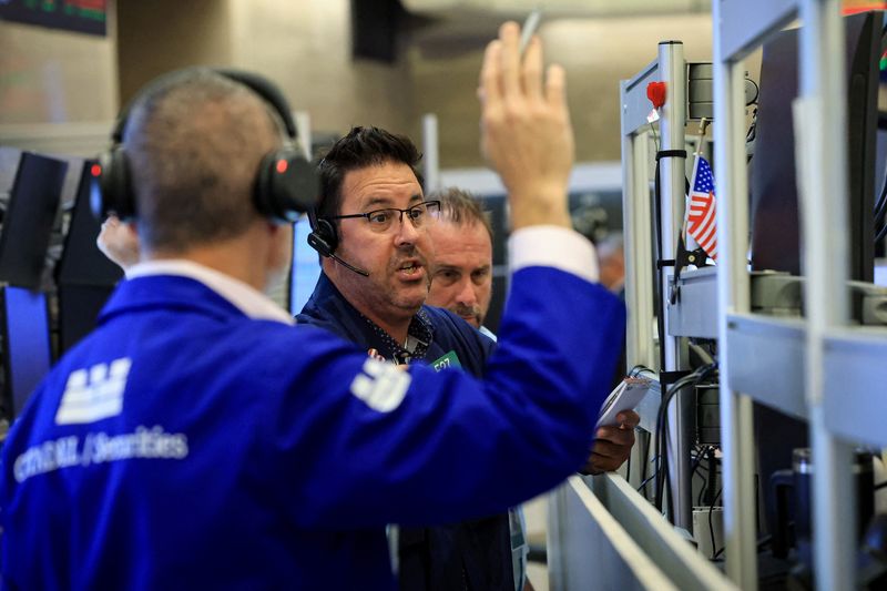 Futures-options traders work on the floor at the New York Stock Exchange's NYSE American (AMEX) in New York City, U.S. July 23, 2026.  REUTERS/Brendan McDermid
