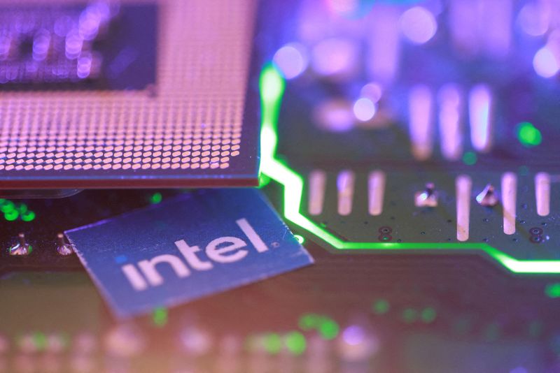 Computer motherboard and Intel chip appear in this illustration taken August 25, 2025. REUTERS/Dado Ruvic/Illustration