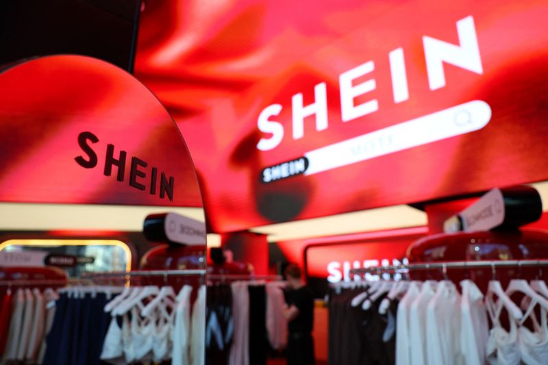 FILE PHOTO: Fashion retailer Shein's logo is seen at its pop-up store at immersive retail space Future Stores, ahead of its opening on September 26, in London, Britain, September 24, 2025. REUTERS/Isabel Infantes/ File Photo