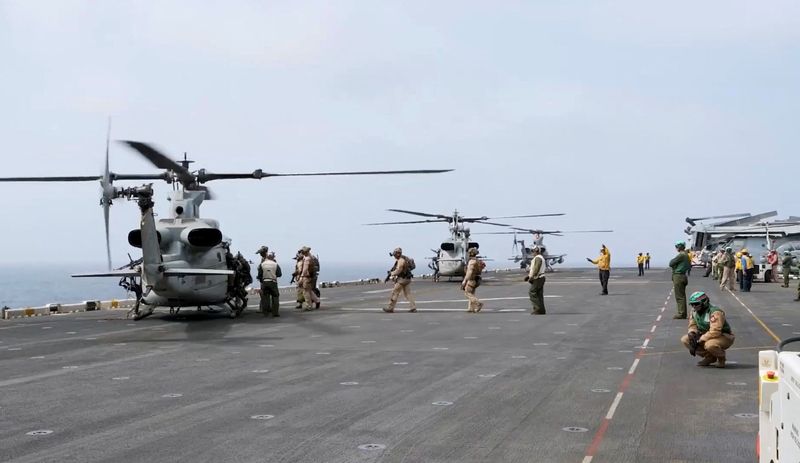 Military helicopters and personnel operate in a location given as the Arabian Sea in this screengrab obtained from a video released by U.S. Central Command (CENTCOM) on July 25, 2026. CENTCOM said the video showed U.S. operations enforcing a naval blockade against Iran. U.S. Central Command/Handout via REUTERS THIS IMAGE HAS BEEN SUPPLIED BY A THIRD PARTY. MANDATORY CREDIT  VERIFICATION: - Reuters could not verify the location or date when the video was recorded.  - No older versions of the footage were found posted online before July 25.  - The identity of one of the ships was confirmed as Charminar by its shape and colours, which matched archive images.  - The identity of the other vessel seen at the end of the video could not be verified.