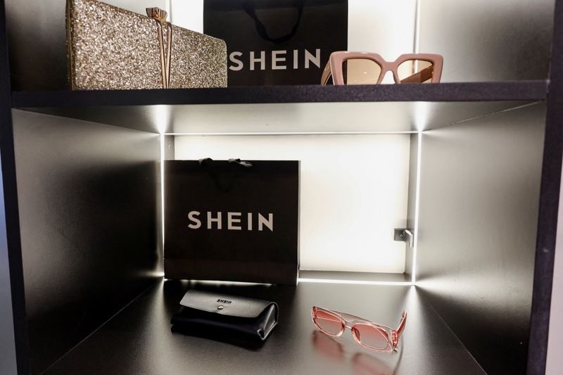 FILE PHOTO: Sunglasses are displayed at the reception of the fast-fashion brand Shein's office in Sao Paulo, Brazil, December 15, 2025. REUTERS/Jorge Silva/File Photo