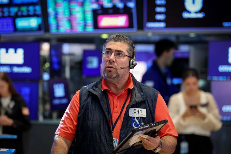 File Photo: A trader works on the floor at the New York Stock Exchange (NYSE) in New York City, U.S., July 24, 2026.  REUTERS/Brendan McDermid/File Photo