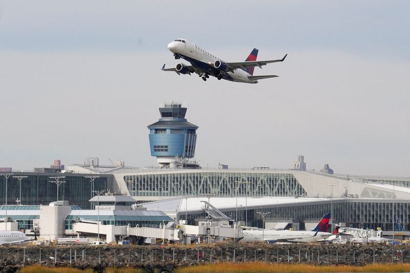 FILE PHOTO: An airplane takes off from New York's Laguardia Airport in the Queens borough of New York City, U.S., November 7, 2025. REUTERS/Ryan Murphy/File Photo