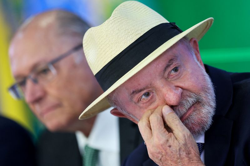 Brazil's President Luiz Inacio Lula da Silva and Vice President Geraldo Alckmin attend a ceremony to sign into law a bill establishing a line of credit for companies affected by new tariffs imposed by the U.S. government, at the Planalto Palace in Brasilia, Brazil July 22, 2026. REUTERS/Adriano Machado