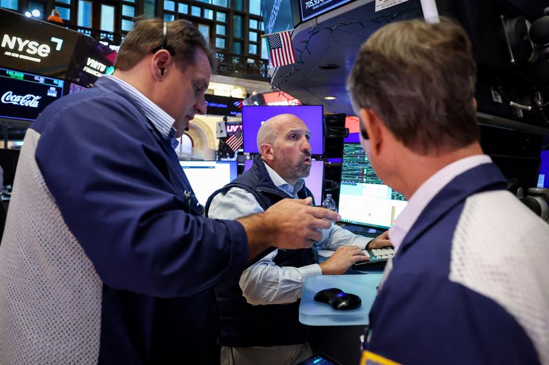 Traders work on the floor at the New York Stock Exchange (NYSE) in New York City, U.S., July 20, 2026.  REUTERS/Brendan McDermid