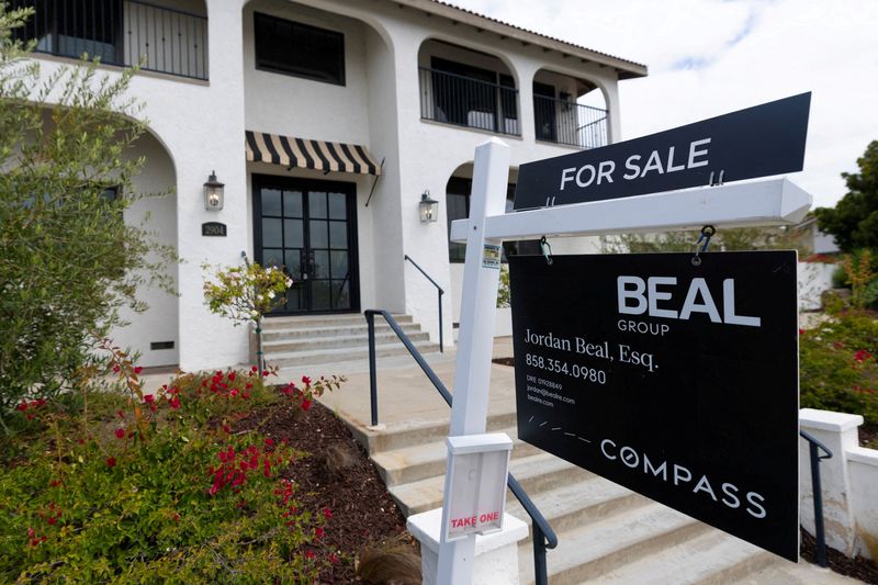 FILE PHOTO: A single family detach home is shown for sale in Carlsbad, California, U.S., May, 13, 2026.  REUTERS/Mike Blake/File Photo