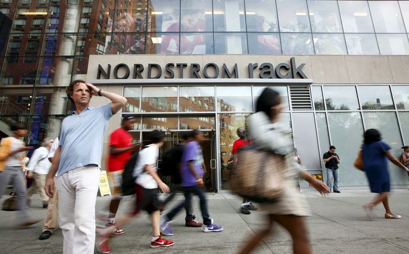 People walk past the Nordstrom Rack store, in New York's Union Square, May 21, 2010.    REUTERS/Chip East/File Photo