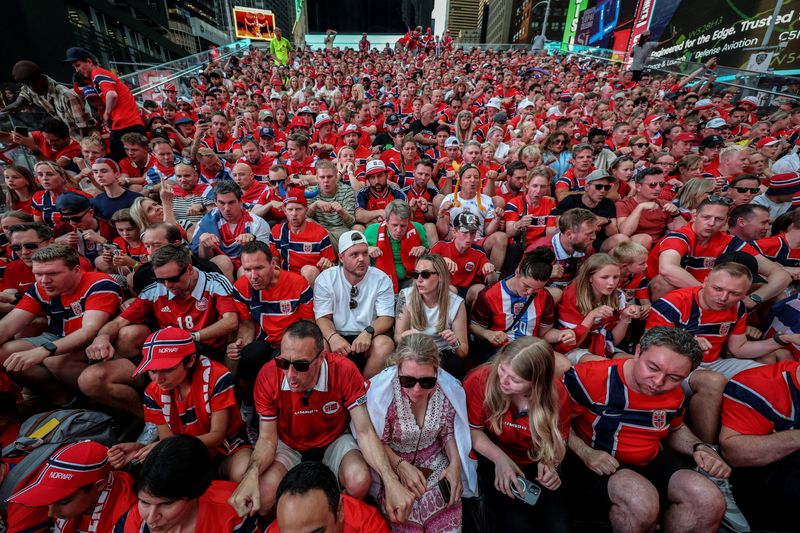 FILE PHOTO: Soccer Football - FIFA World Cup 2026 - Group I - Norway v Senegal - Previews - New York, U.S. - June 21, 2026  Norway fans perform the Viking row in Times Square REUTERS/John Sibley/File Photo