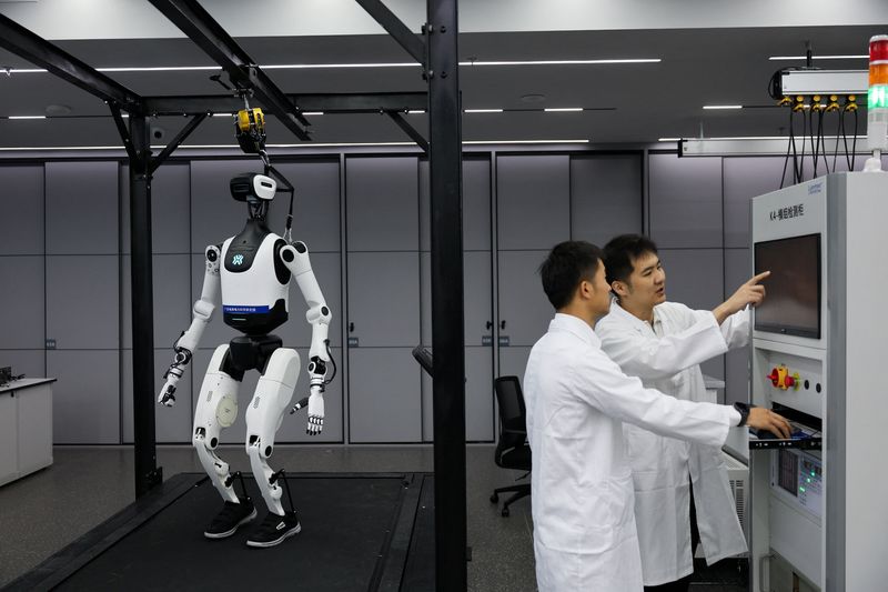 A humanoid robot at a robotics laboratory during a government-organized media trip in Guangzhou, Guangdong province, China, April 16, 2026. REUTERS/Go Nakamura