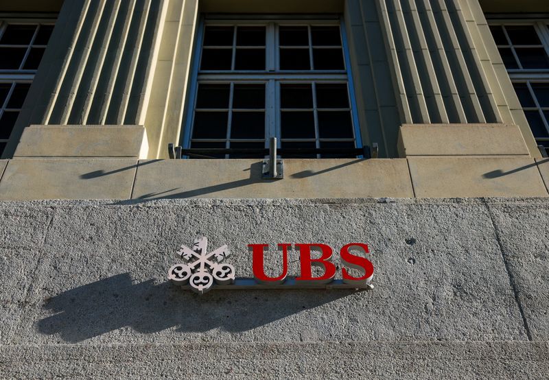 FILE PHOTO: A logo of Swiss bank UBS is seen on their branch in Bern, Switzerland, April 21, 2026. REUTERS/Denis Balibouse/File Photo