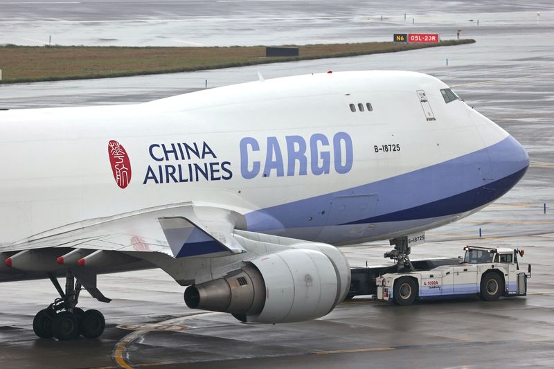 FILE PHOTO: A China Airlines Cargo plane taxis at the Taiwan Taoyuan International Airport in Taoyuan, Taiwan, January 7, 2021. REUTERS/Ann Wang/File Photo