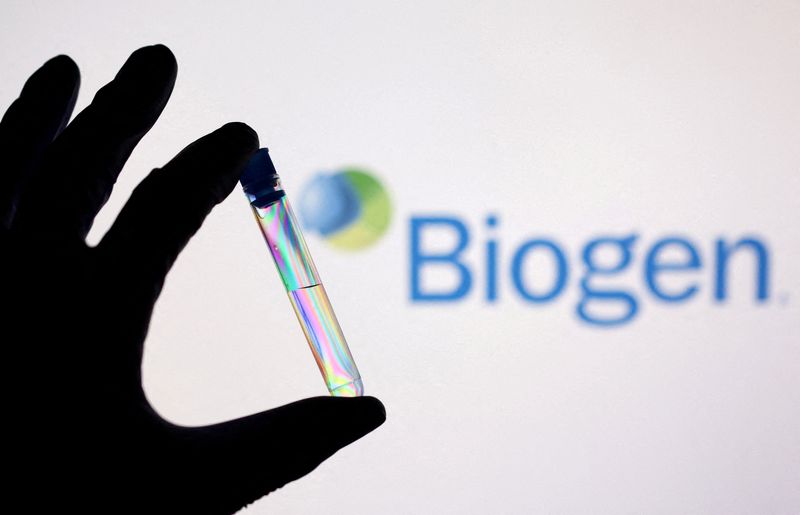 FILE PHOTO: A test tube is seen in front of displayed Biogen logo in this illustration created on December 1, 2021. REUTERS/Dado Ruvic/Illustration/File Photo
