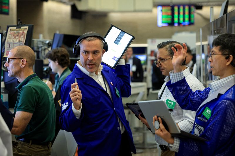 Futures-options traders work on the floor at the New York Stock Exchange's NYSE American (AMEX) in New York City, U.S. July 28, 2026.  REUTERS/Brendan McDermid