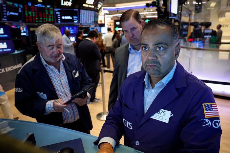 Traders work on the floor at the New York Stock Exchange (NYSE) in New York City, U.S., July 29, 2026.  REUTERS/Brendan McDermid         TPX IMAGES OF THE DAY