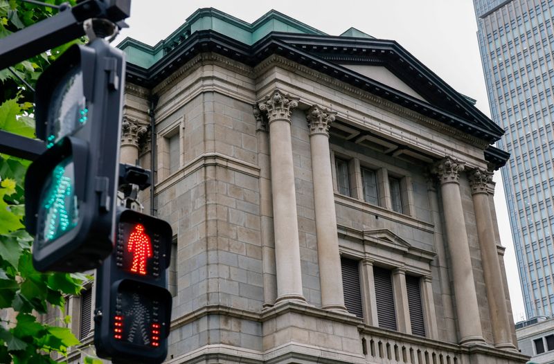 Traffic signs in front of the Bank of Japan building in Tokyo, Japan, June 15, 2026. REUTERS/Kim Kyung-Hoon