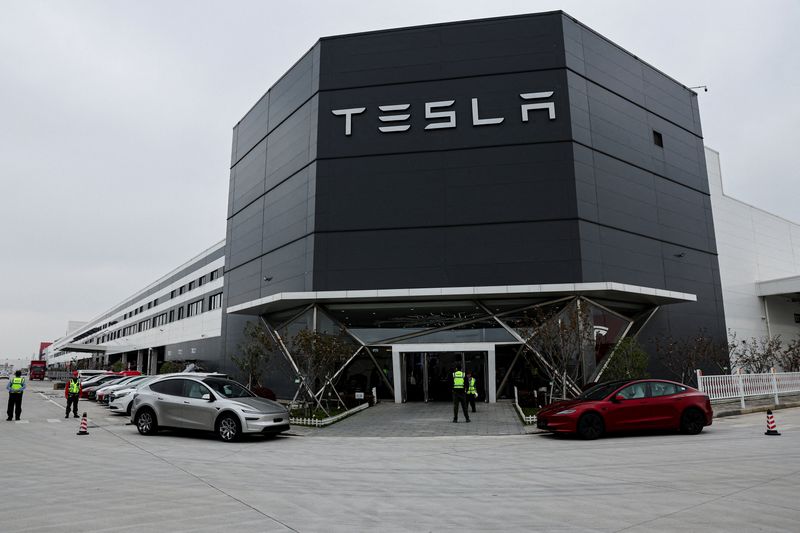 FILE PHOTO: Exterior view of the Tesla Gigafactory during a government-organised media trip in Shanghai, China, April 14, 2026. REUTERS/Go Nakamura/File Photo