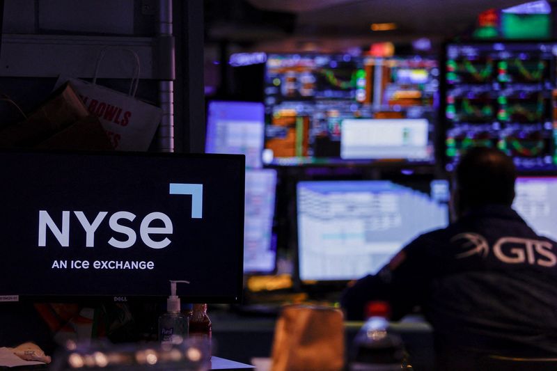 FILE PHOTO: A trader works on the floor of the New York Stock Exchange (NYSE) in New York City, U.S., July 6, 2026. REUTERS/Jeenah Moon/File Photo