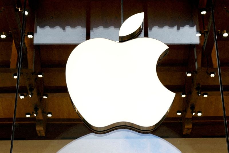 FILE PHOTO: View of an Apple logo at an Apple store in Paris, France, April 23, 2025. REUTERS/Abdul Saboor/File Photo