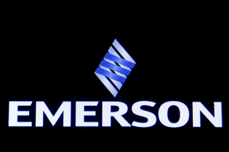 Emerson Electric Co is displayed on a screen on the floor at the New York Stock Exchange (NYSE) in New York, U.S., January 13, 2020. REUTERS/Brendan McDermid/File Photo