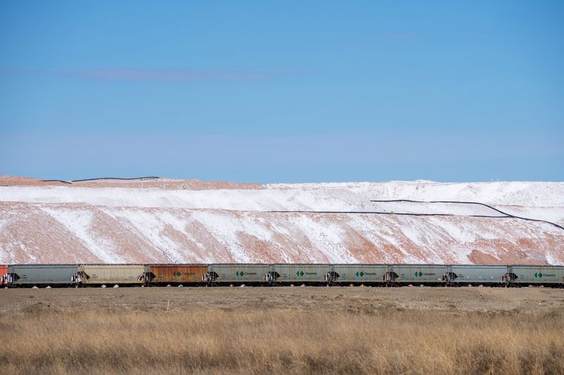 Train cars are parked before they are loaded at the Nutrien Cory Potash mine that is a conventional mine that produces potash products used by agriculture producers near Saskatoon, Saskatchewan, Canada April 20, 2025.  REUTERS/Todd Korol