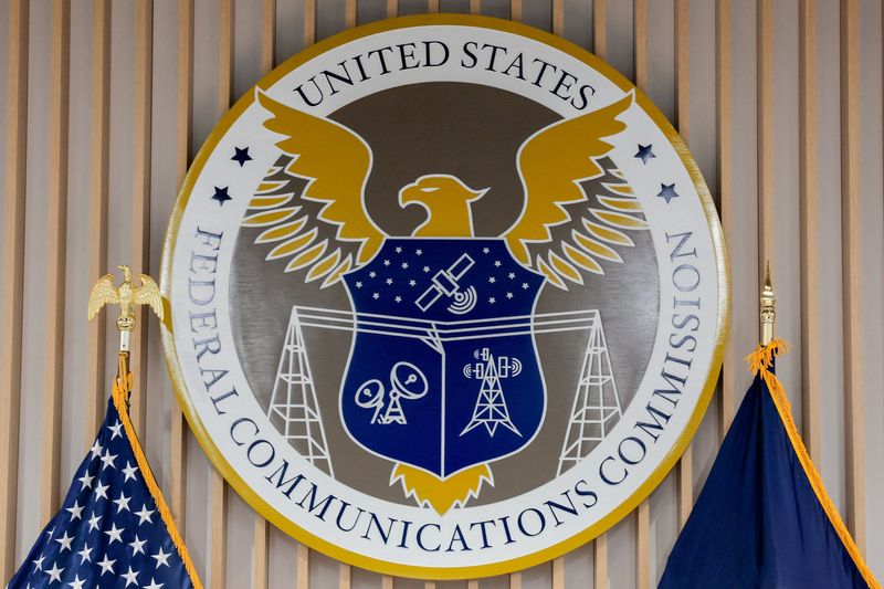 The U.S. Federal Communications Commission (FCC) seal decorates a wall inside their headquarters in Washington, D.C., U.S., July 22, 2026. REUTERS/Kylie Cooper