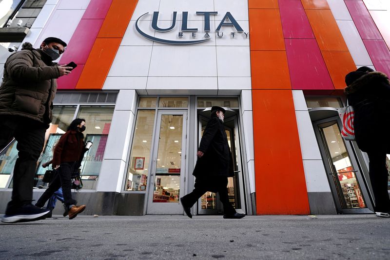 FILE PHOTO: People walk past an Ulta Beauty store in the Manhattan borough of New York City, New York, U.S., March 8, 2022.  REUTERS/Carlo Allegri/File Photo