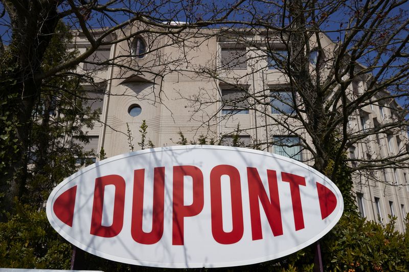 FILE PHOTO: A logo is pictured outside of Dupont offices in Geneva, Switzerland, April 15, 2021. REUTERS/Denis Balibouse/File Photo