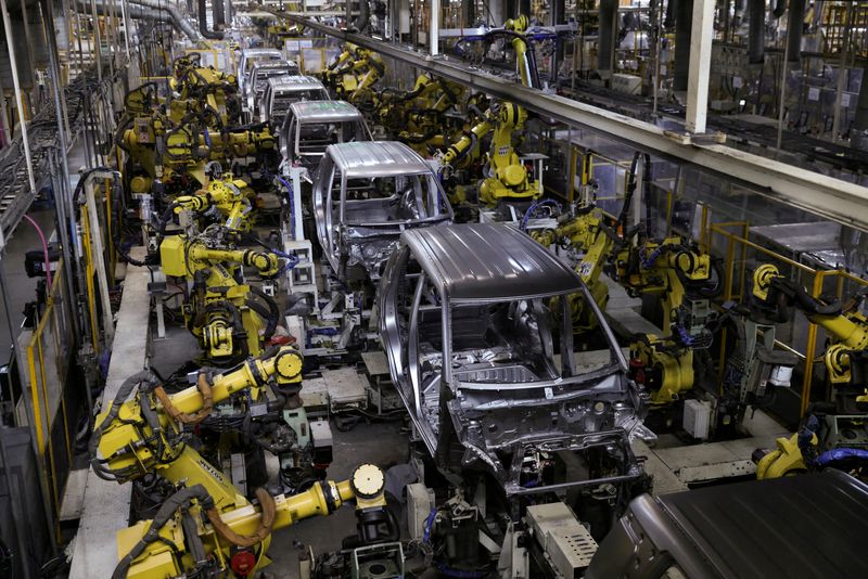 FILE PHOTO: FILE PHOTO: Car panels are welded using robotic machines at the manufacturing plant of Maruti Suzuki in Manesar, in the northern state of Haryana, India, September 26, 2023. REUTERS/Anushree Fadnavis/File Photo/File Photo