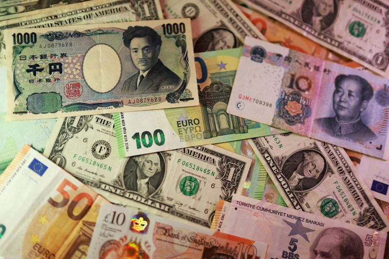 FILE PHOTO: U.S. dollar, Euro, Yen, Pound, Turkish Lira, Yuan banknotes are seen in this illustration taken March 24, 2026. REUTERS/Dado Ruvic/Illustration/File Photo